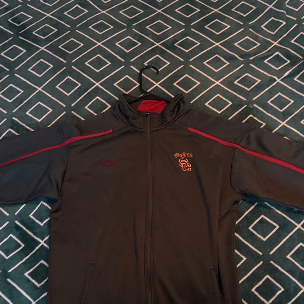 Nike Men's Black Bomber Jacket with Red and Gold Details